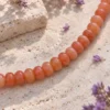 detalle-collar-tipo-choker-de-donuts-de-aventurina-naranja Collar tipo choker de donuts de Aventurina naranja